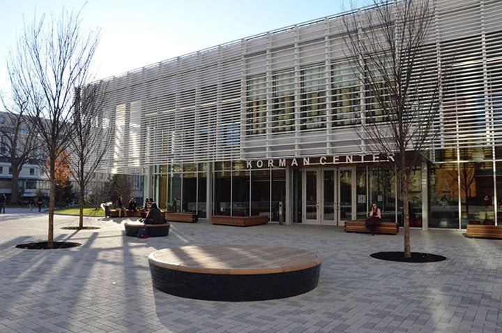 Korman Center Building on Drexel's campus with paved courtyard in front