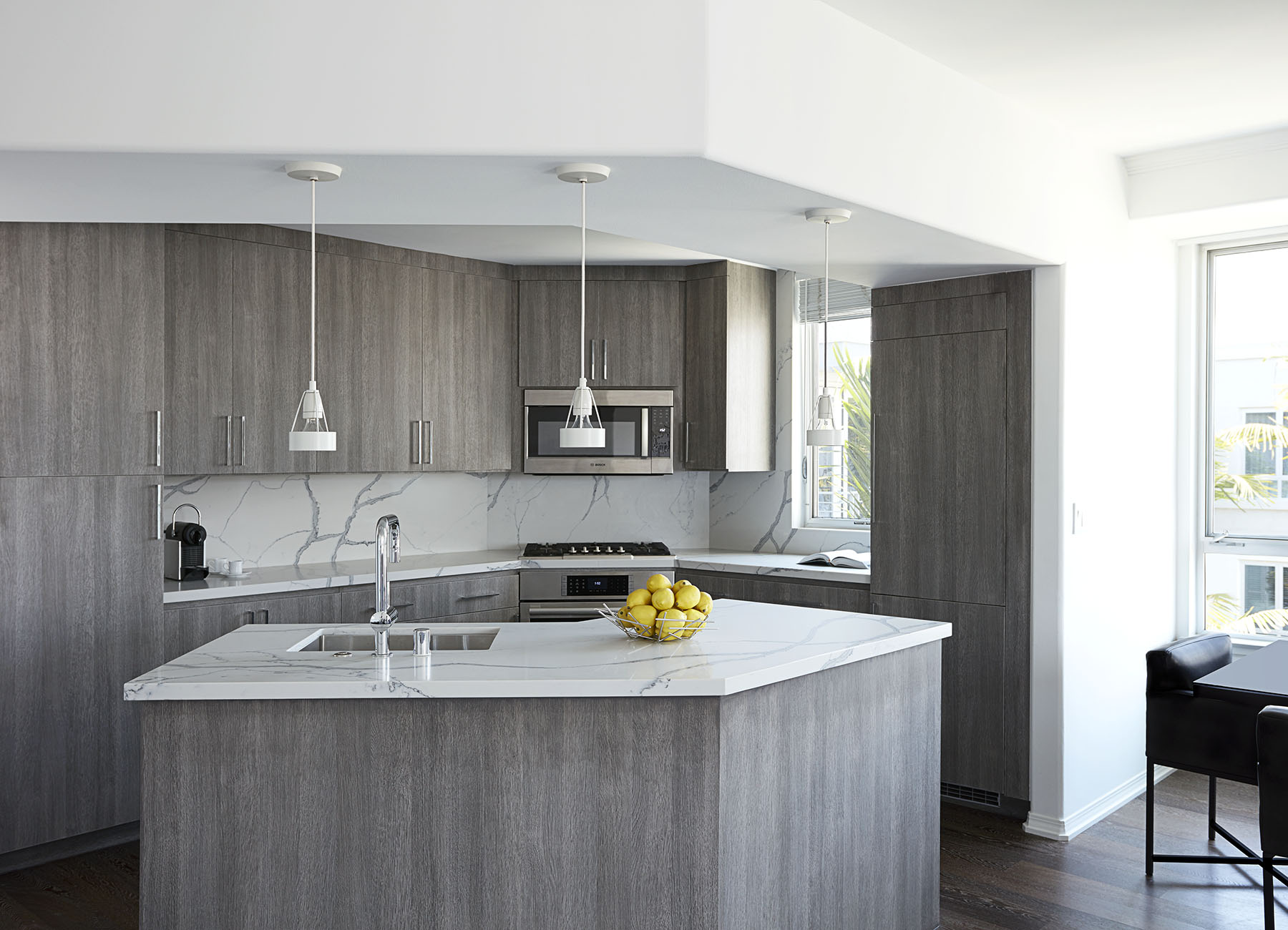 AKA Beverly Hills penthouse kitchen with gray cabinets