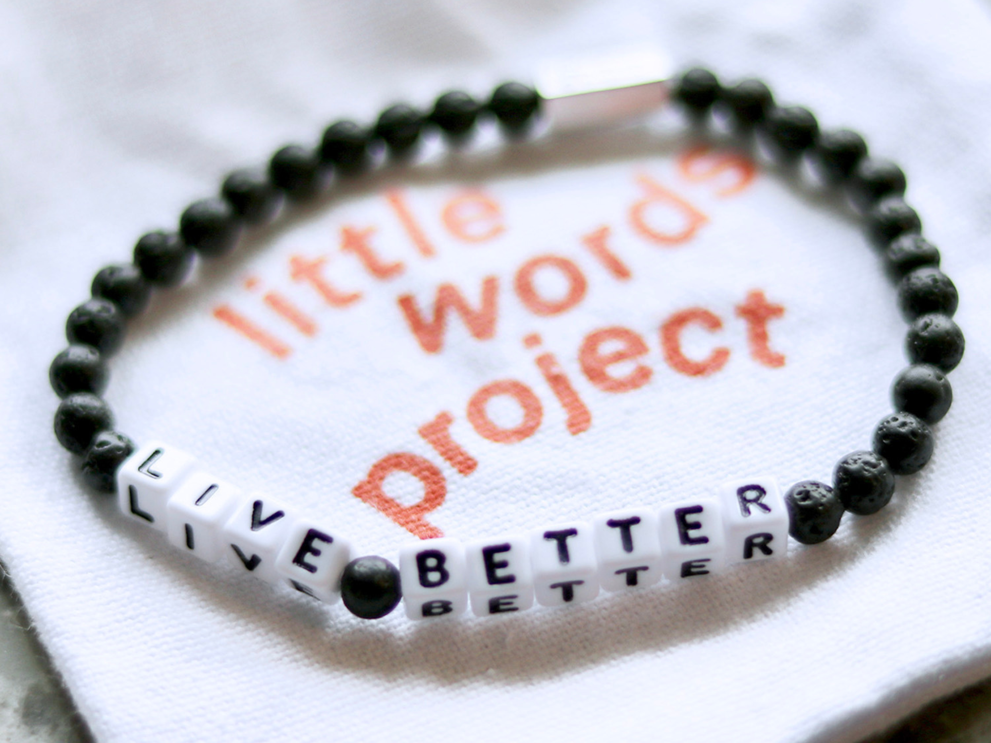 AVE Living Partners With Little Words Project® On Fashion Accessory To Fight Hunger