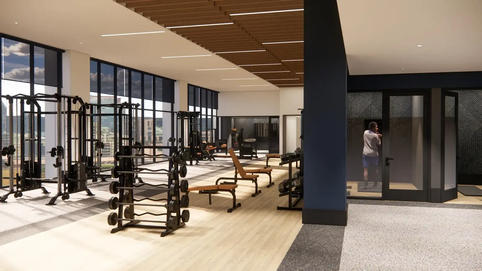 a rendering of a fitness center at AVE Station House with workout equipment