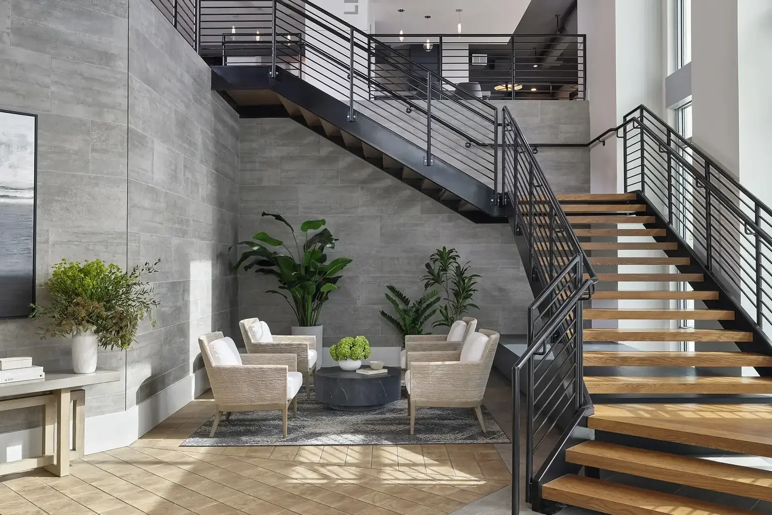 AVE Tampa Riverwalk lobby with a view of a large staircase and seating beside it