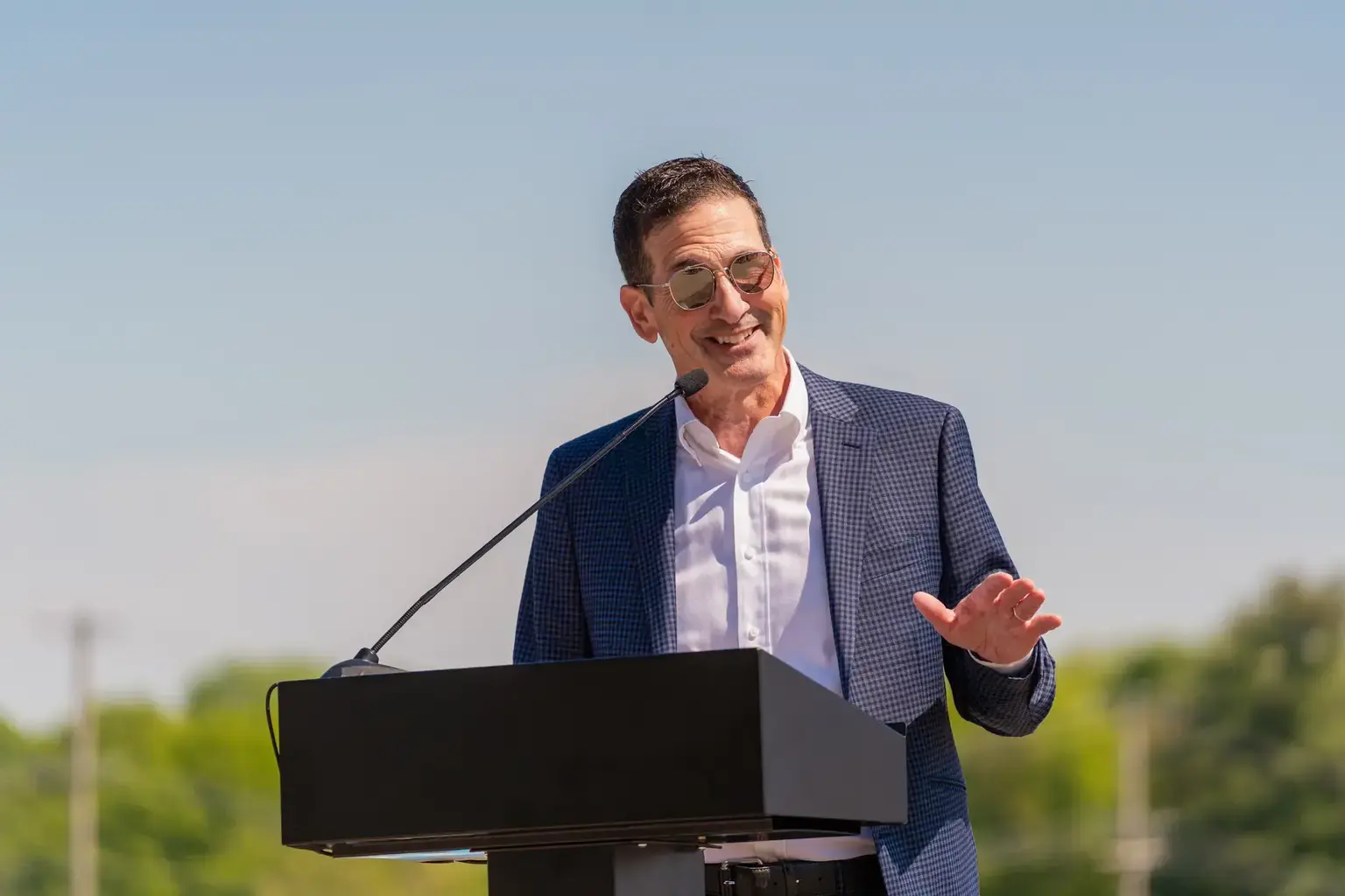 Speaker addressing guests during the AVE Horsham groundbreaking event