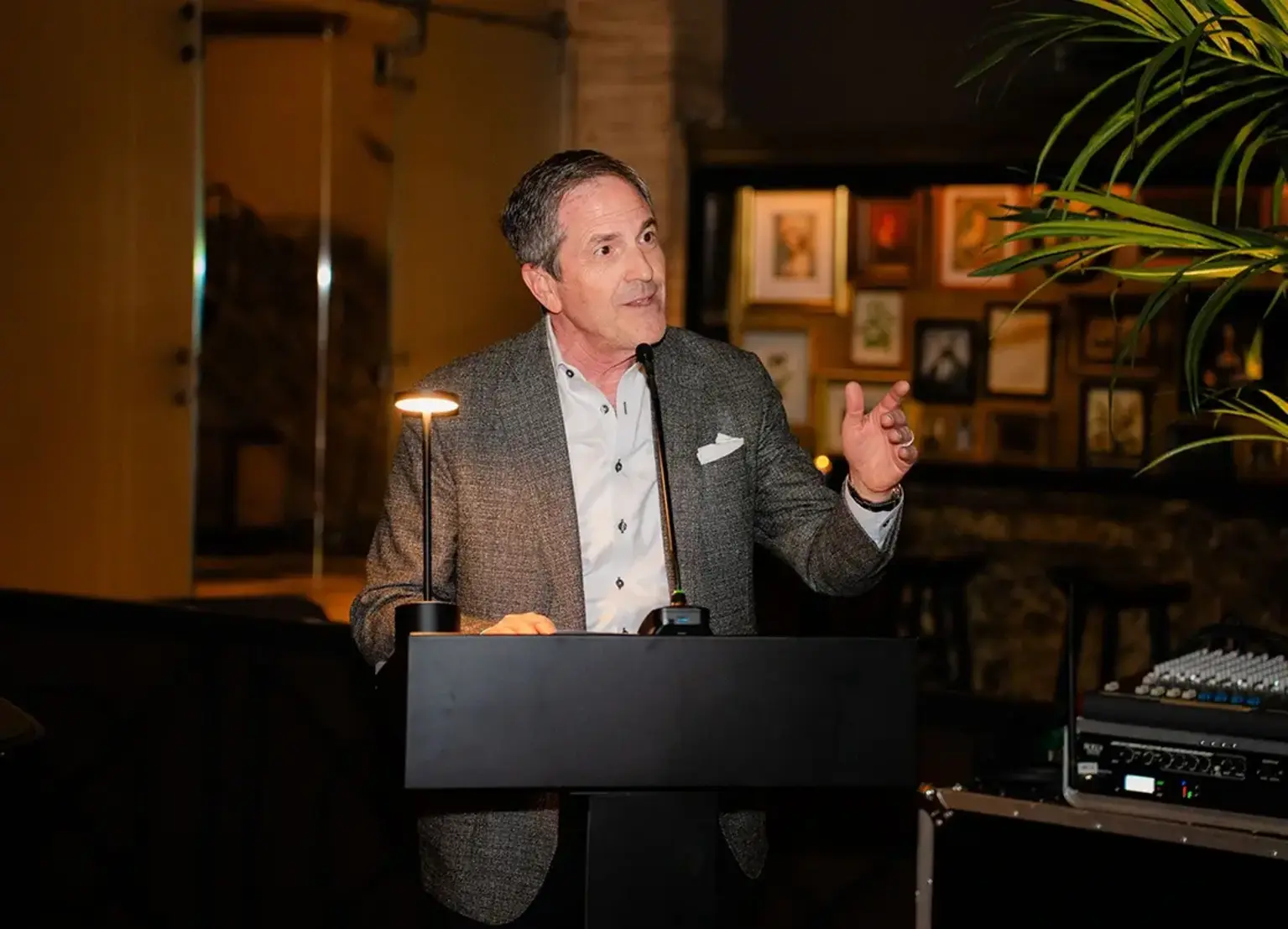 Brad Korman taking a stage at The Franklin Residences Centennial Event