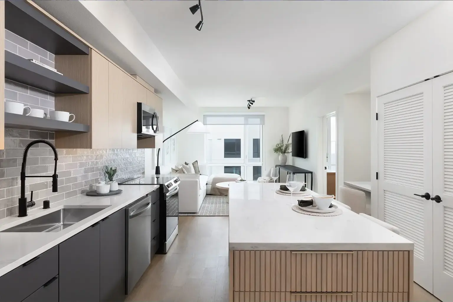 AVE Santa Clara Kitchen with modern white counter tops and dark cabinets