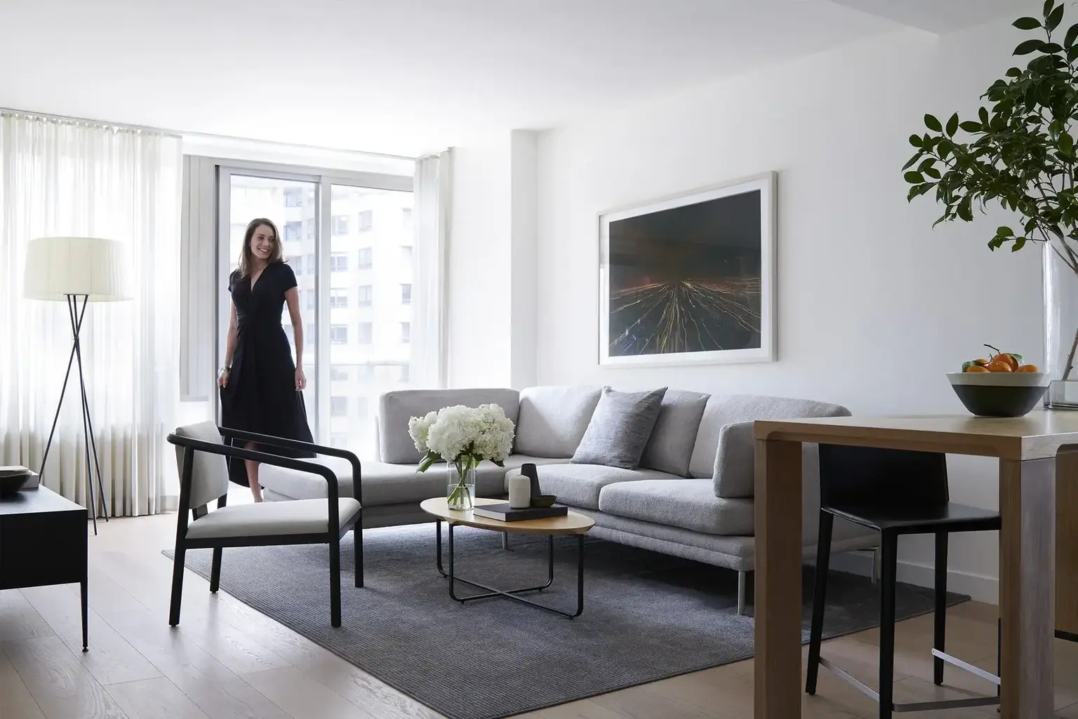 A woman in an AKA living room 